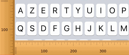 Les 2 premières lignes d'un clavier virtuel mobile comportant 10 touches par ligne avec une règle verticale mesurant 120 px de haut et une règle horizontale mesurant 390 px de large. 